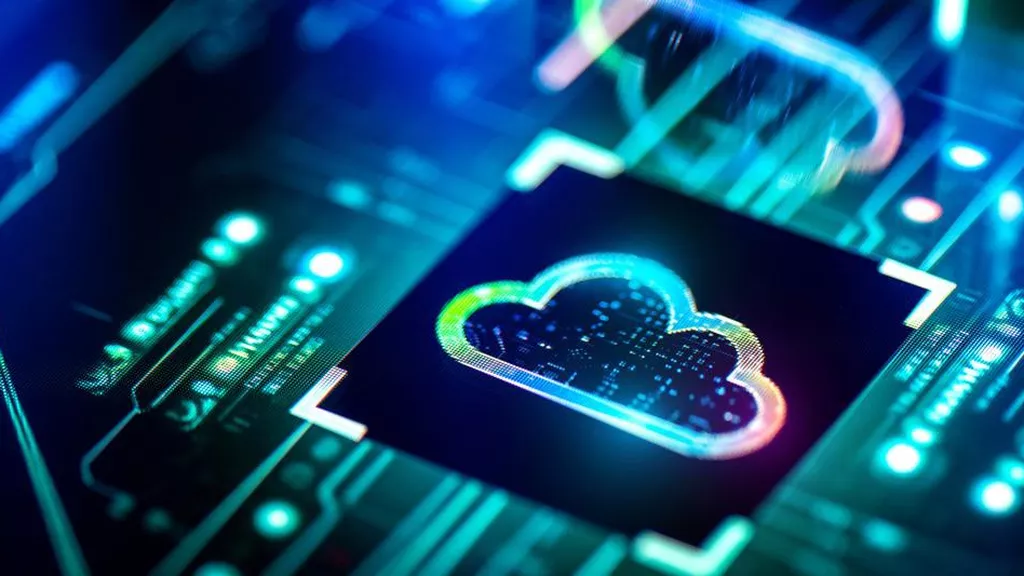 Futuristic microchip with glowing cloud icon representing cloud computing services and digital infrastructure